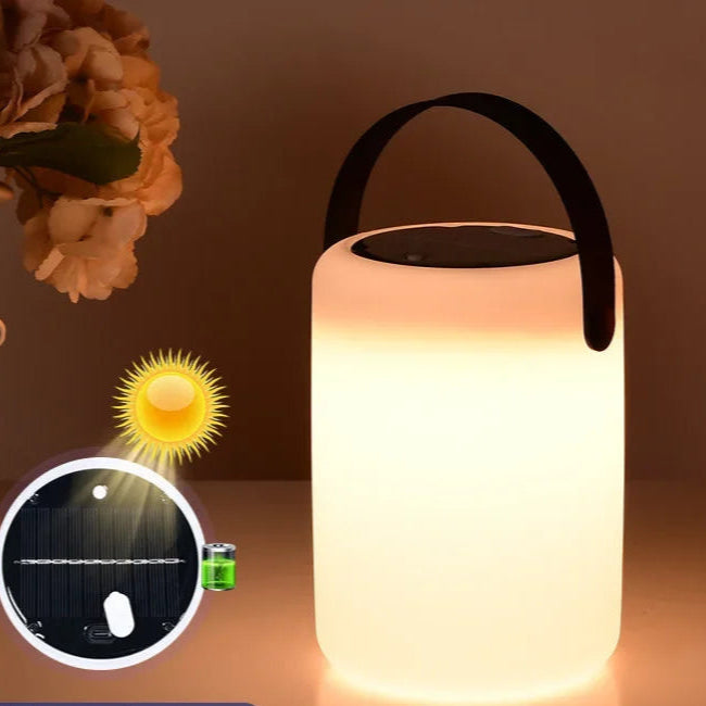 Sleek Solar LED Table Lantern – Portable Outdoor Camping Light, USB rechargeable with weatherproof design and silicone handle.